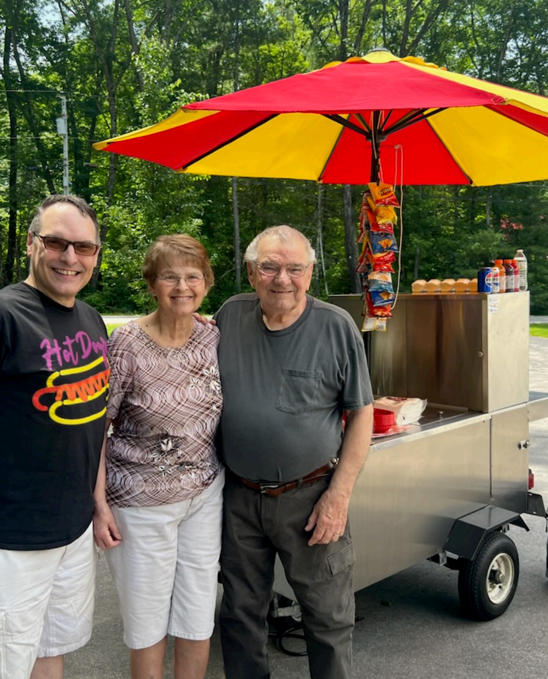Mike with family in front of the cart