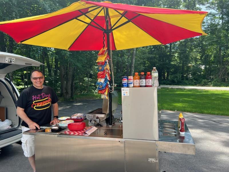 Mike preparing food at the Manch Vegas cart